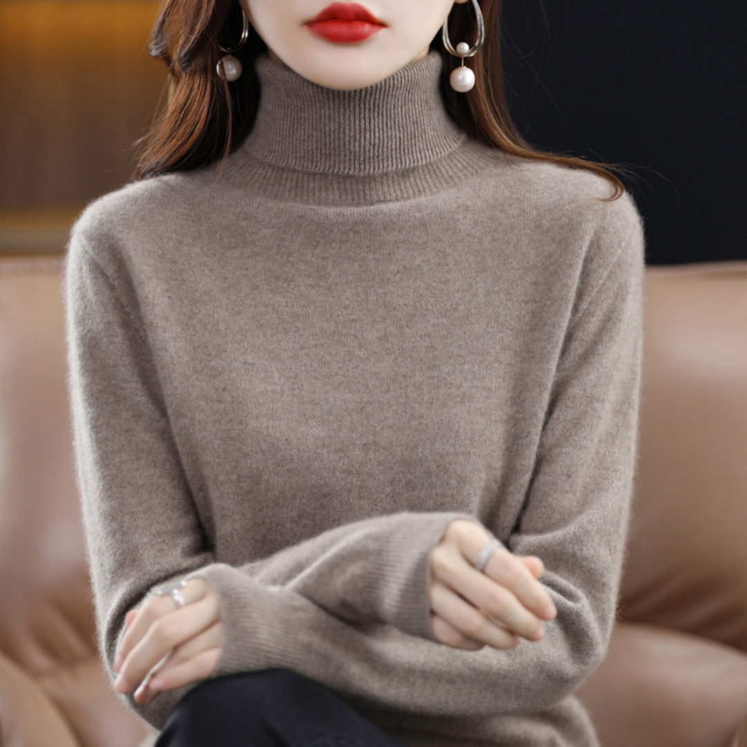 Pull femme col roulé tendance, un vêtement hivernal élégant pour un style moderne et confortable.