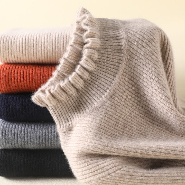Mode féminine : pull chic col roulé pour femme, pièce essentielle pour la saison froide.