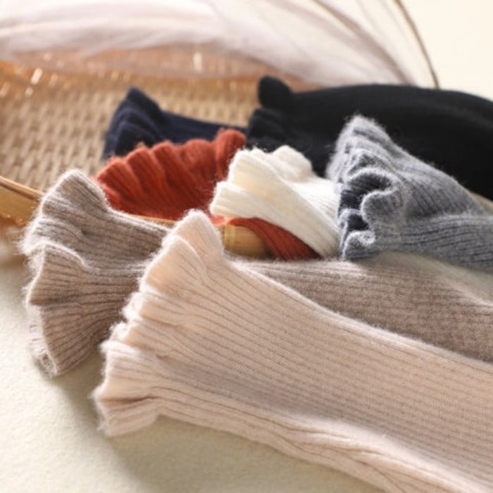 Pull élégant col roulé pour femme, parfait pour un look chic au quotidien ou plus habillé.