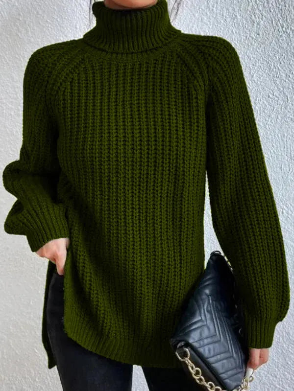 Vêtement femme hiver. Pull long à col roulé, manches raglan, ourlet fendu. Chic et décontracté.