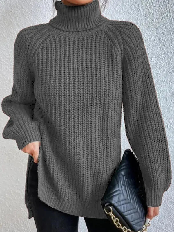 Pull femme mode hiver, col roulé et confortable. Manches raglan pour un style décontracté et chic.