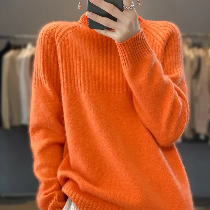 Pull femme confort col roulé, avec texture côtelée, parfait pour un style hivernal moderne.