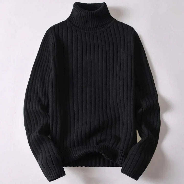 Homme portant un pull col roulé hivernal, style élégant et décontracté. Vêtement masculin confortable pour le quotidien.