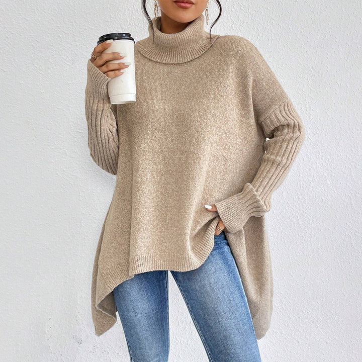 Pull chic femme, col roulé, ourlet irrégulier, idéal pour un look décontracté ou élégant cet hiver.
