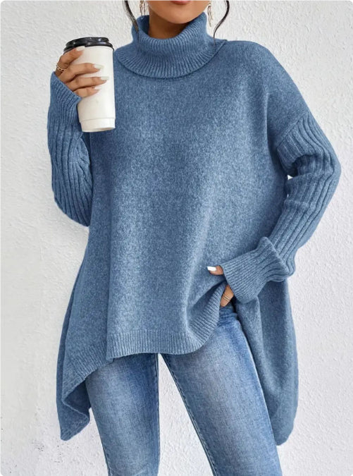 Vêtement femme moderne, pull col roulé ample, ourlet irrégulier, pour un look hivernal tendance.