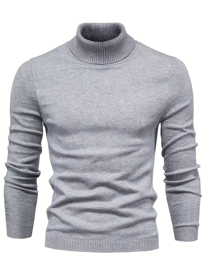 Pull col roulé élégant pour homme, gris anthracite. Idéal pour l'hiver, chaud et confortable. Mode masculine chic.