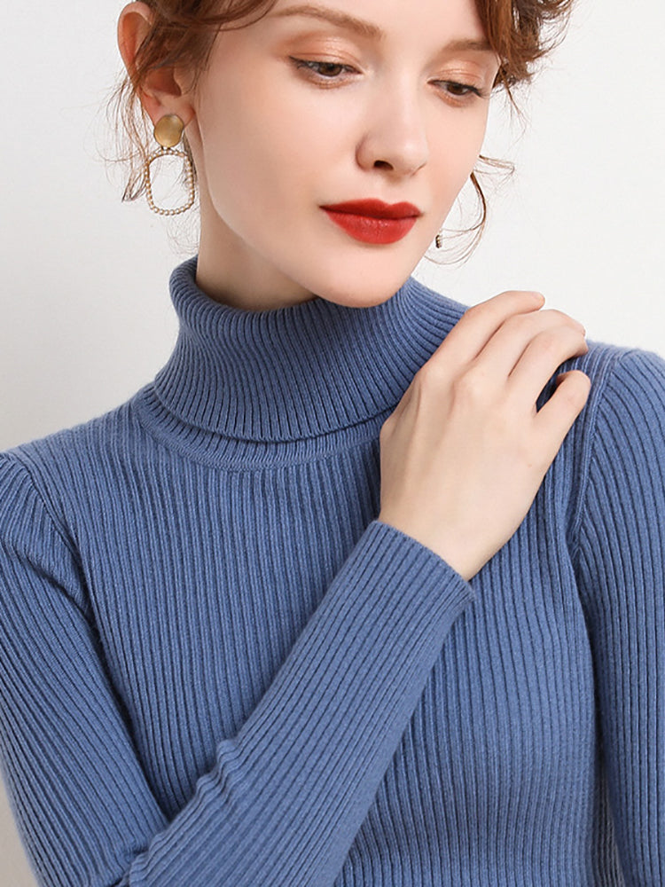 "Pull col roulé femme, élégant et doux, en cachemire et laine, idéal pour automne et hiver, couleur neutre et classique."