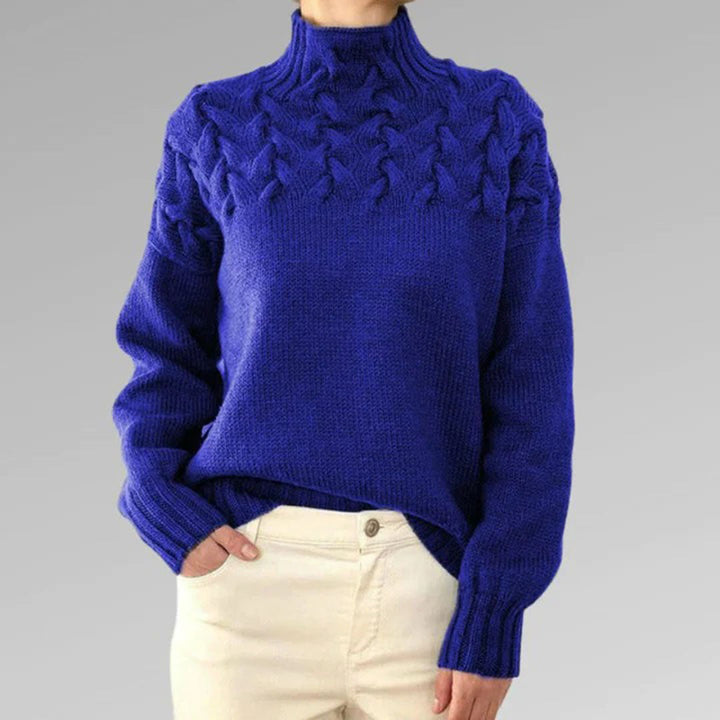 Pull col roulé femme, tricot chaud hiver. Modèle élégant et confortable.