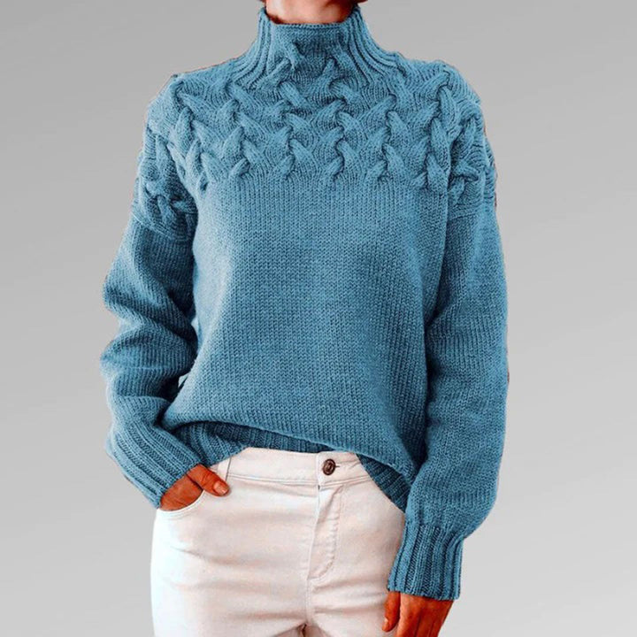 Pull col roulé femme, tricot chaud hiver. Modèle élégant et confortable.