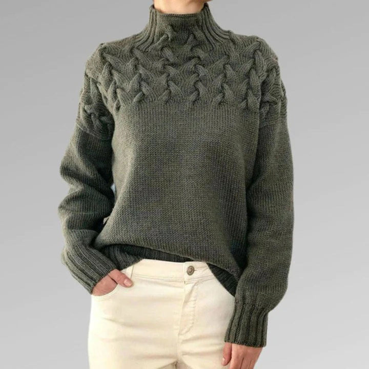 Pull col roulé femme, tricot chaud hiver. Modèle élégant et confortable.