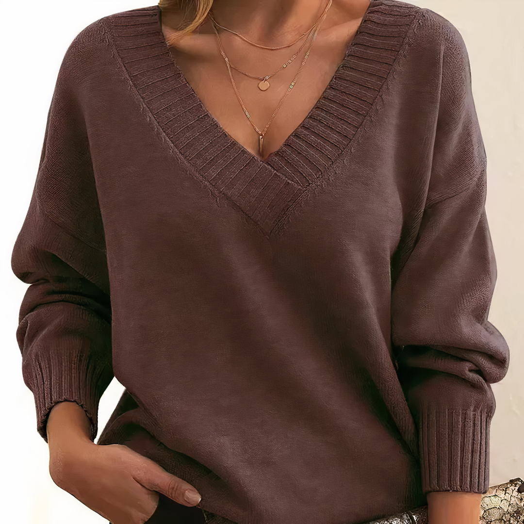 Pull femme col V chic et polyvalent, doux et chaud, idéal pour le confort élégant de l'hiver.