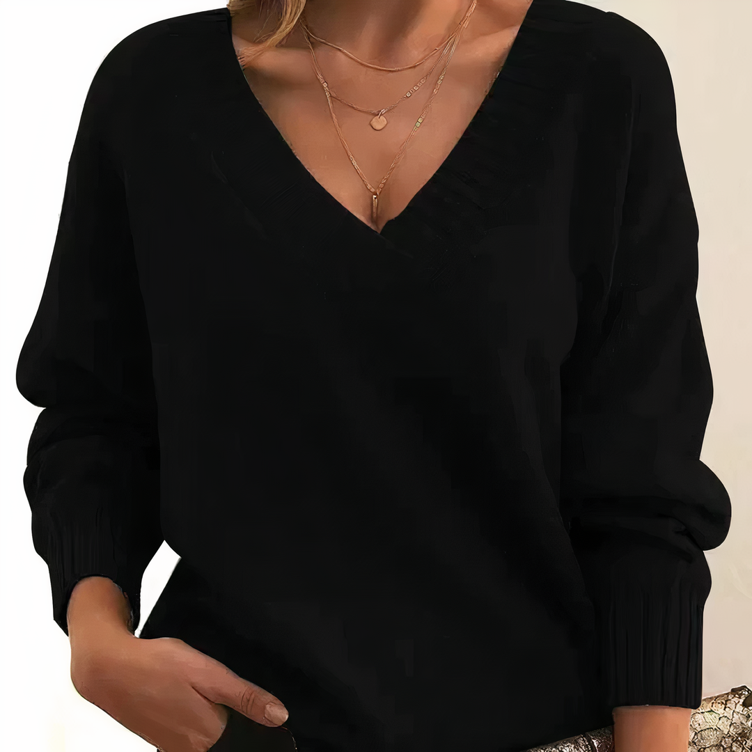 Pull femme élégant à col V, doux et chaud, parfait pour une tenue chic d'hiver ou d'automne.