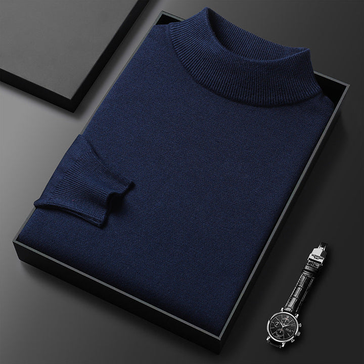 Confortable pull homme tricoté, col montant demi-zippé, parfait pour rester au chaud cet hiver.