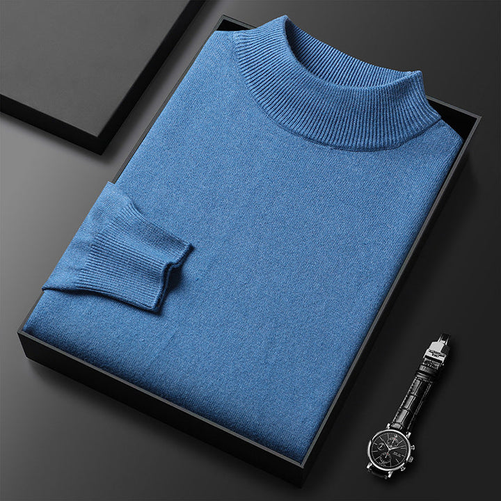 Ce pull homme tricoté est chaud et confortable, avec un col montant demi-zippé, idéal pour l'hiver.
