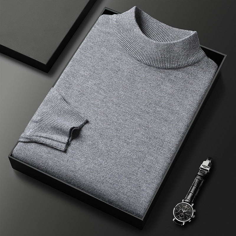 Photo d'un pull d'hiver homme élégant, col montant demi-zippé en tricot, offrant chaleur.