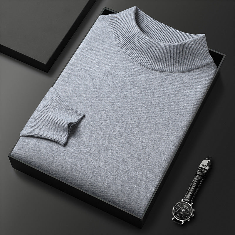 Pull hiver homme en tricot, col montant demi-zippé, pour un look chic et décontracté en automne.