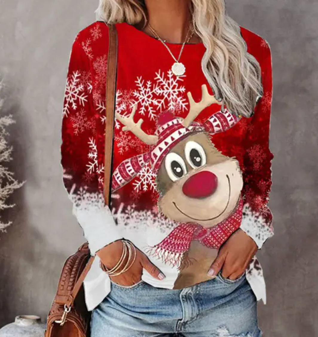 Pull de Noël femme douillet avec motif renne et flocons, parfait pour l'hiver festif.