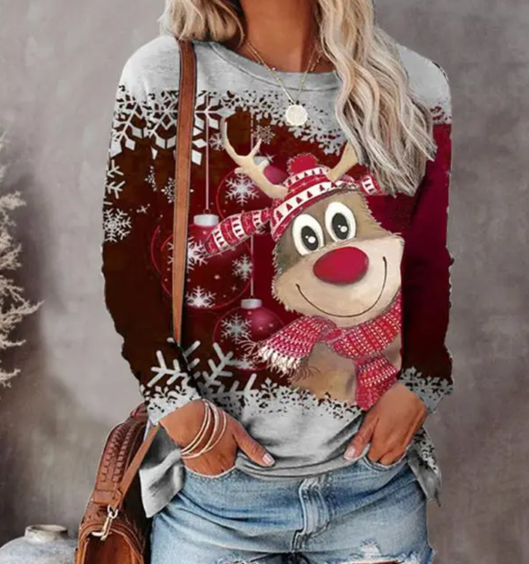Pull de Noël femme fantaisie, design renne & flocons. Douillet, confortable pour la mode d'hiver festive.