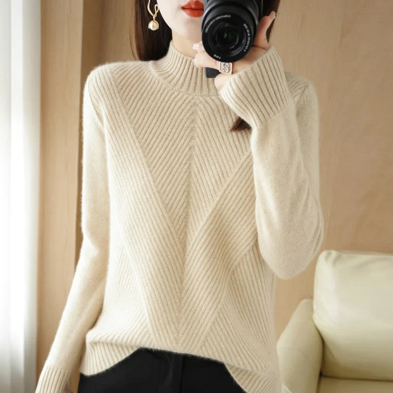 Pull élégant femme, coupe flatteuse, confort optimal.  Parfait printemps/automne.