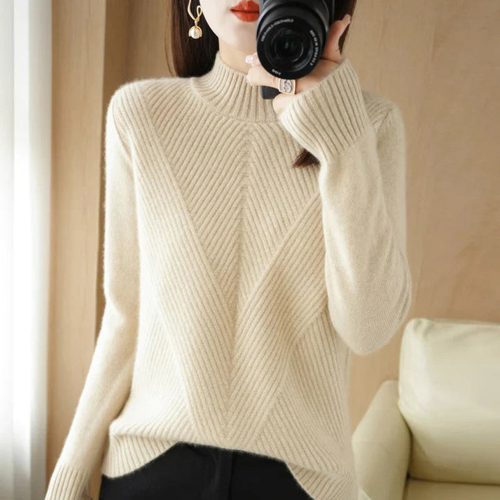 Pull élégant femme, coupe flatteuse, confort optimal.  Parfait printemps/automne.