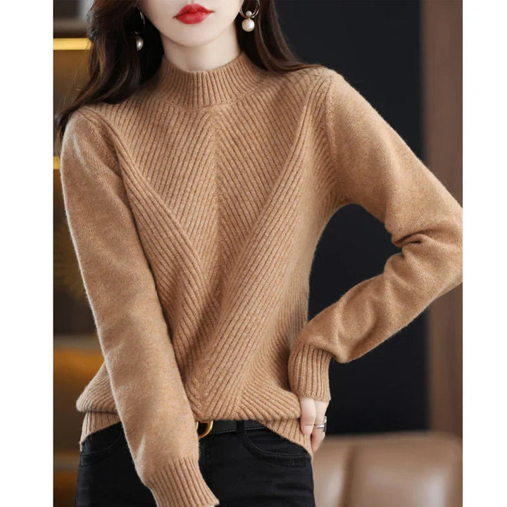 Pull élégant femme, coupe flatteuse, confort optimal.  Parfait printemps/automne.