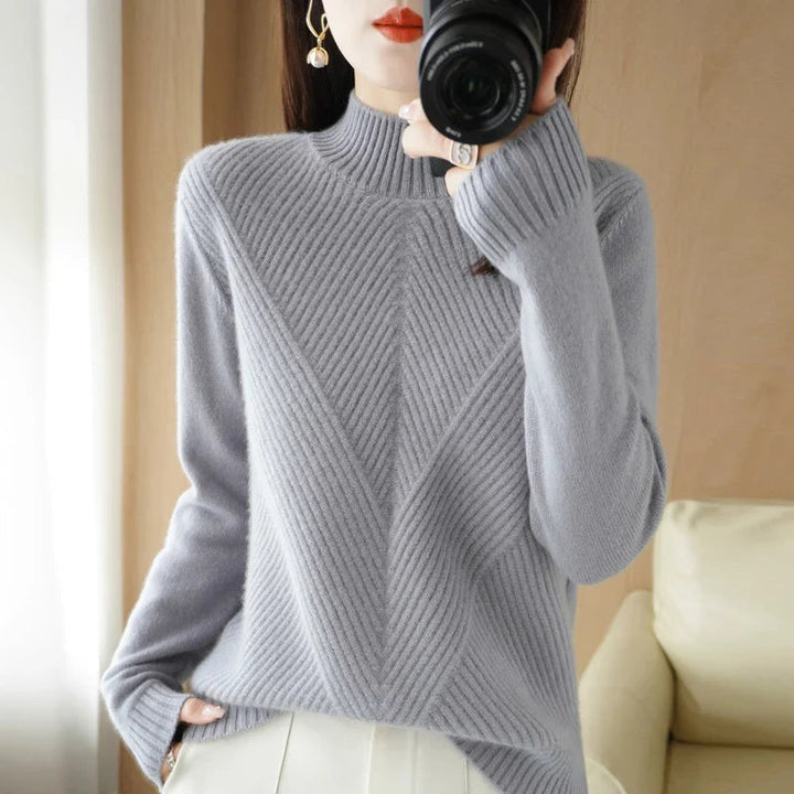 Pull élégant femme, coupe flatteuse, confort optimal.  Parfait printemps/automne.