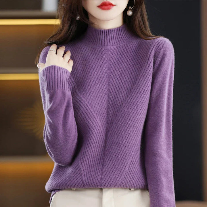 Pull élégant femme, coupe flatteuse, confort optimal.  Parfait printemps/automne.