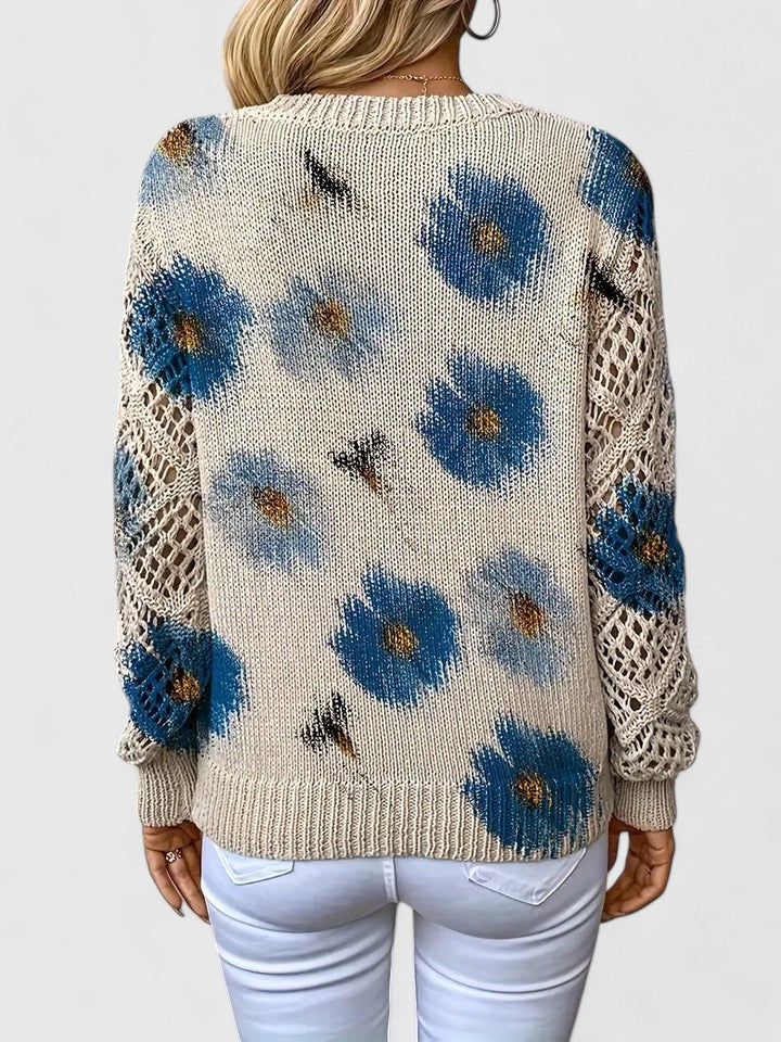 Pull femme à col V fleuri, design moderne, idéal pour un style polyvalent et chic toute l'année.
