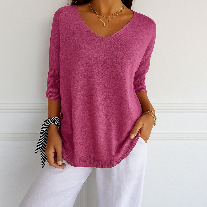 Pull femme col V, maille fine, doux et élégant.  Coupe fluide, confortable.  Parfait pour toutes les occasions.
