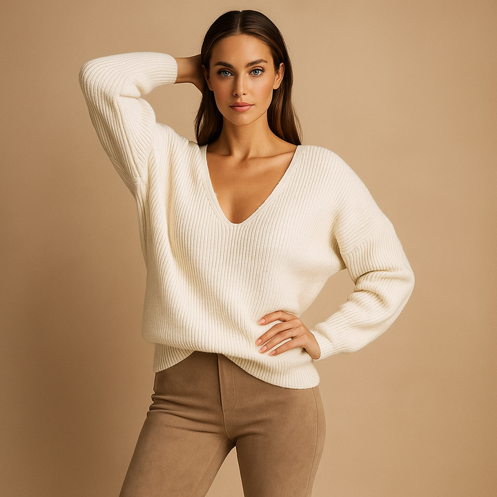 Pull femme à col en V, texture douce et confortable pour toutes saisons. Élégance décontractée chic.