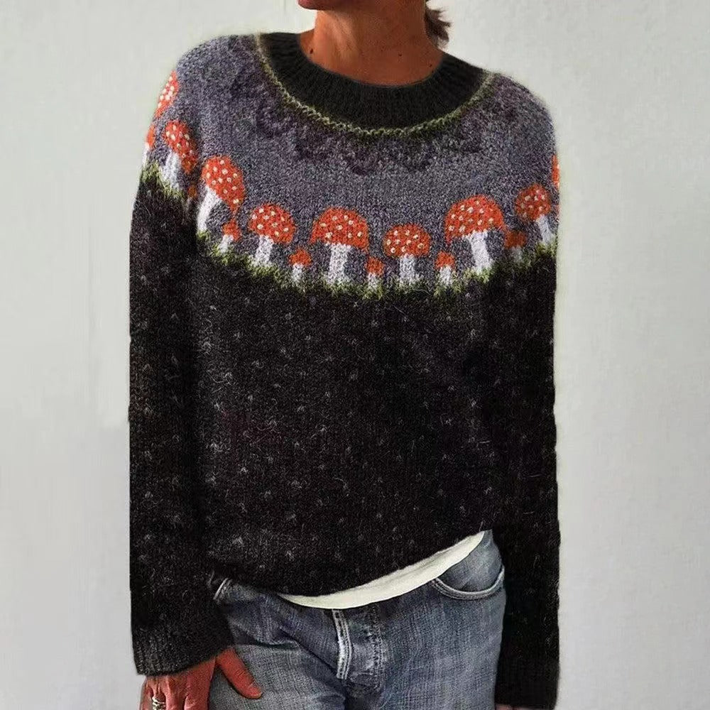 Gros plan d'un pull femme en maille douce, soulignant la texture luxueuse et le confort du tissu.