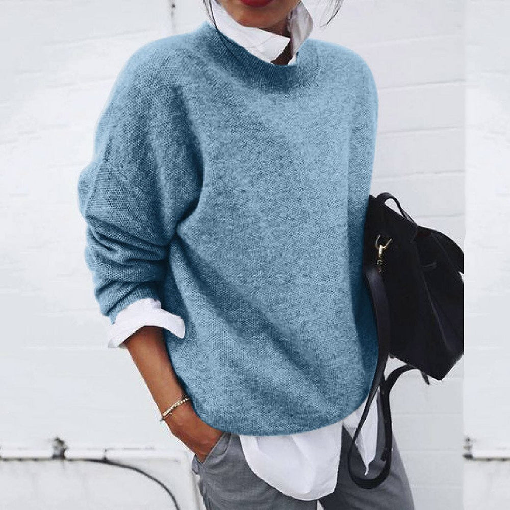 Pull femme confortable et polyvalent, parfait pour une tenue décontractée ou une tenue de bureau élégante.