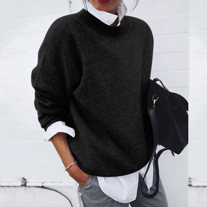 Pull femme en tricot doux et confortable, parfait pour un style intemporel et élégant. Idéal pour le bureau.