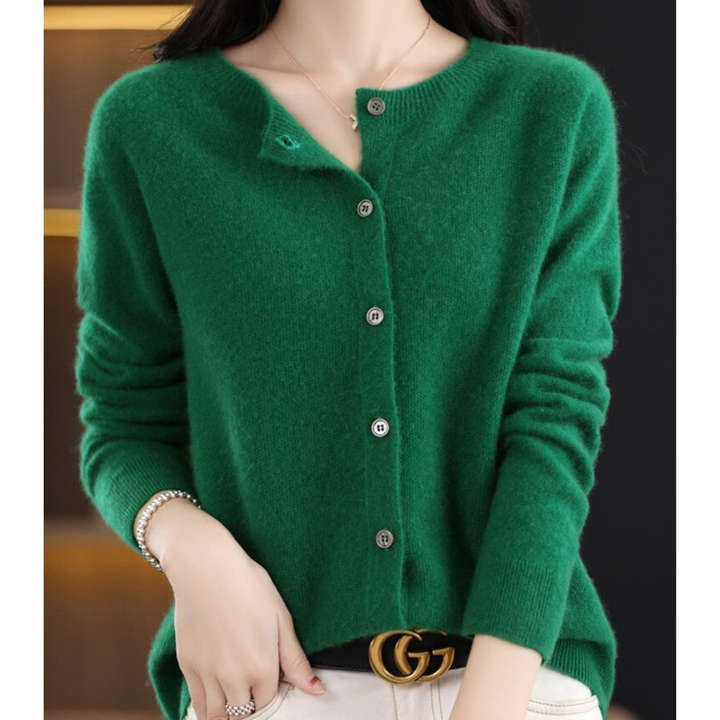 Pull femme en laine mérinos, col rond, chaud et élégant.  Parfait pour l'hiver.