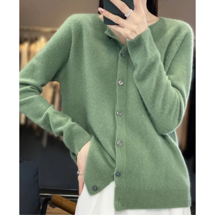 Pull femme en laine mérinos, col rond, chaud et élégant.  Parfait pour l'hiver.