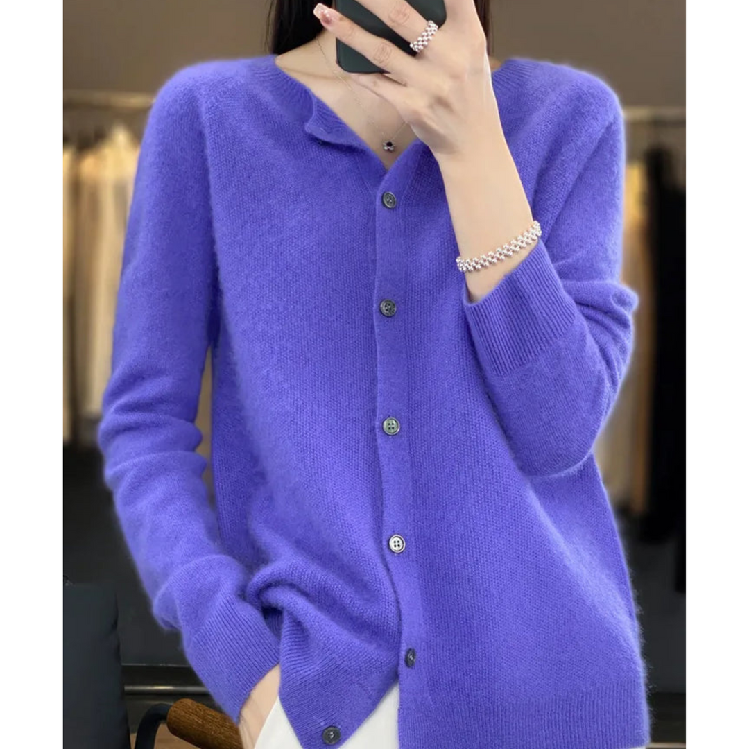 Pull femme en laine mérinos, col rond, chaud et élégant.  Parfait pour l'hiver.