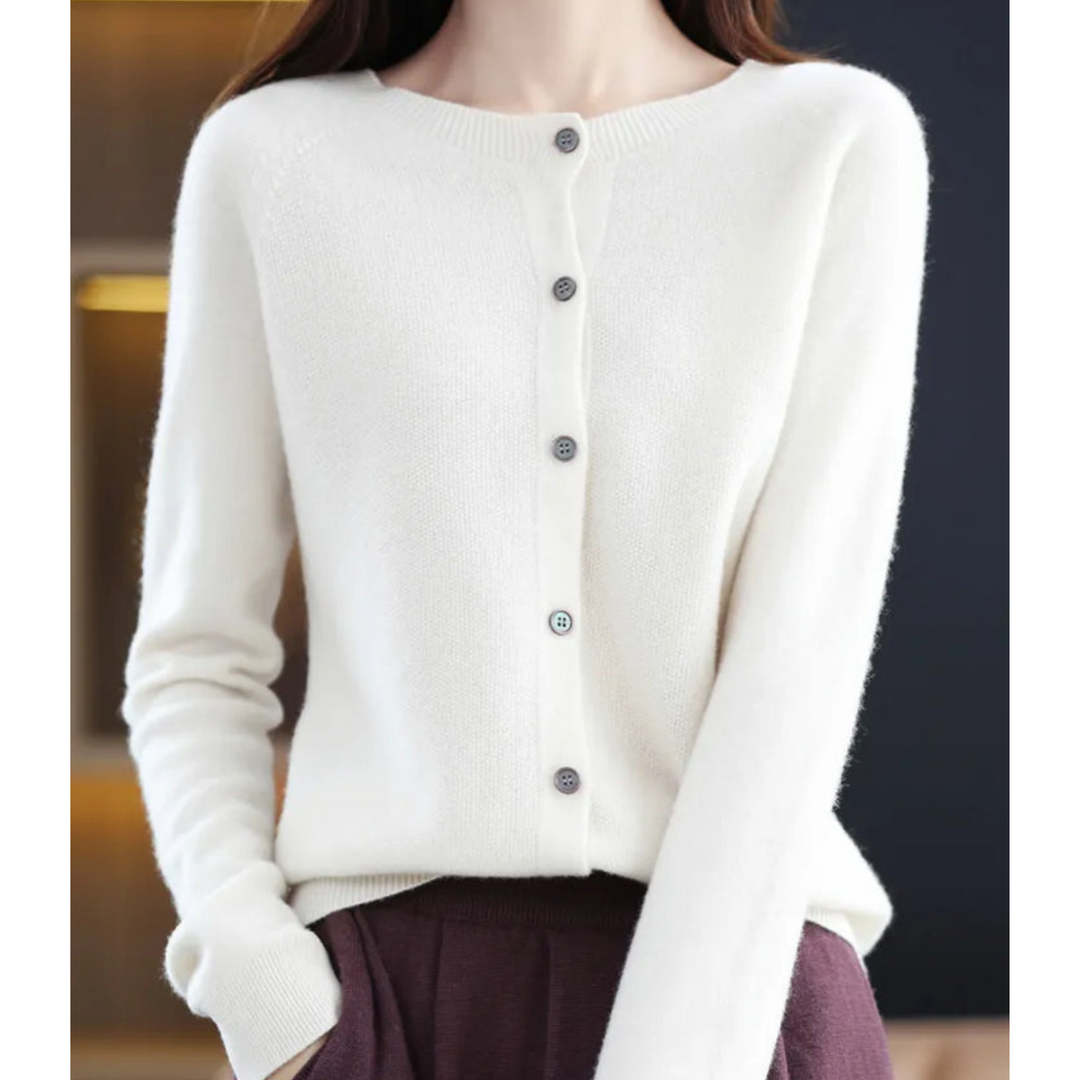 Pull femme en laine mérinos, col rond, chaud et élégant.  Parfait pour l'hiver.