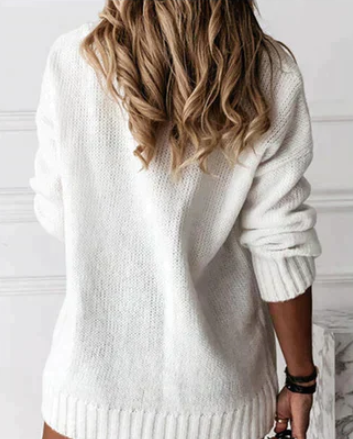 Vue détaillée du pull femme confortable, texture douce. Idéal pour un style élégant et décontracté, toutes saisons.