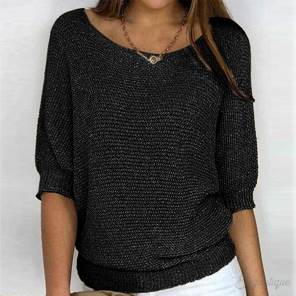 Pull femme oversize élégant et moderne. Chandail décontracté à col rond, parfait pour l'automne-hiver.