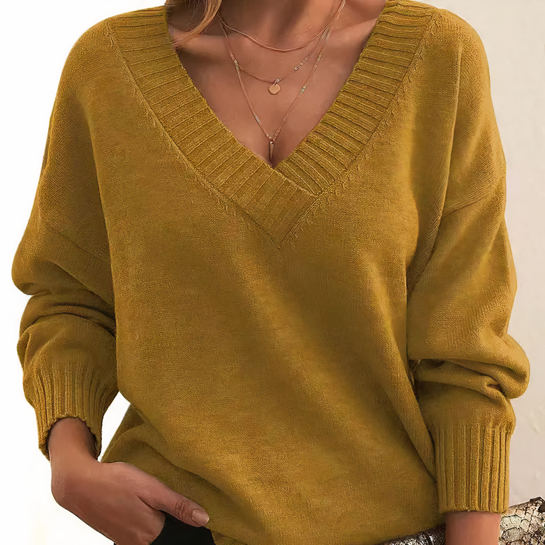 Pull chaud et élégant pour femme, idéal en hiver. Confort douillet et style classique chic, une pièce mode essentielle.