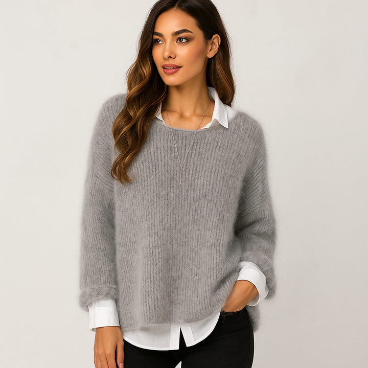 Pull femme élégant et doux, idéal pour l'automne-hiver. Chandail confortable et chic pour une tenue moderne.