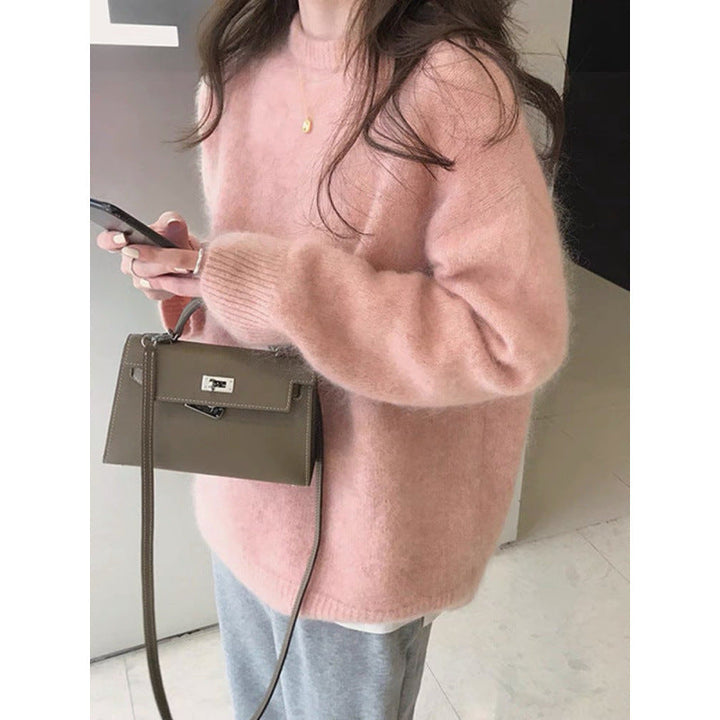 Pull oversize femme mode, confortable et chic, idéal pour les tenues décontractées d'automne-hiver.