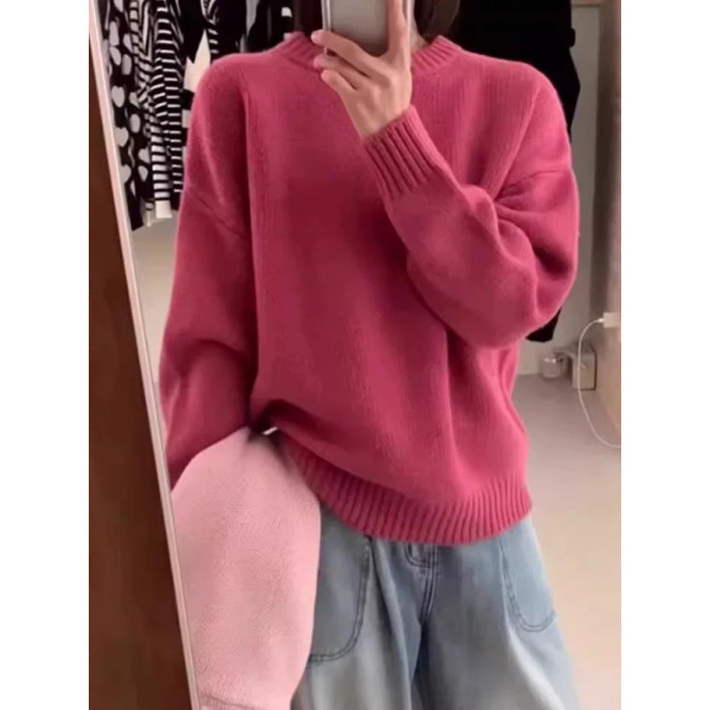 Pull femme col rond ample, chaud et élégant, parfait pour le confort quotidien en saison froide.