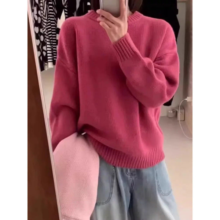 Pull femme col rond ample, chaud et élégant, parfait pour le confort quotidien en saison froide.