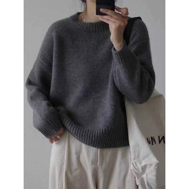Mode hiver femme : pull ample et confortable, manches longues, parfait pour toute occasion.