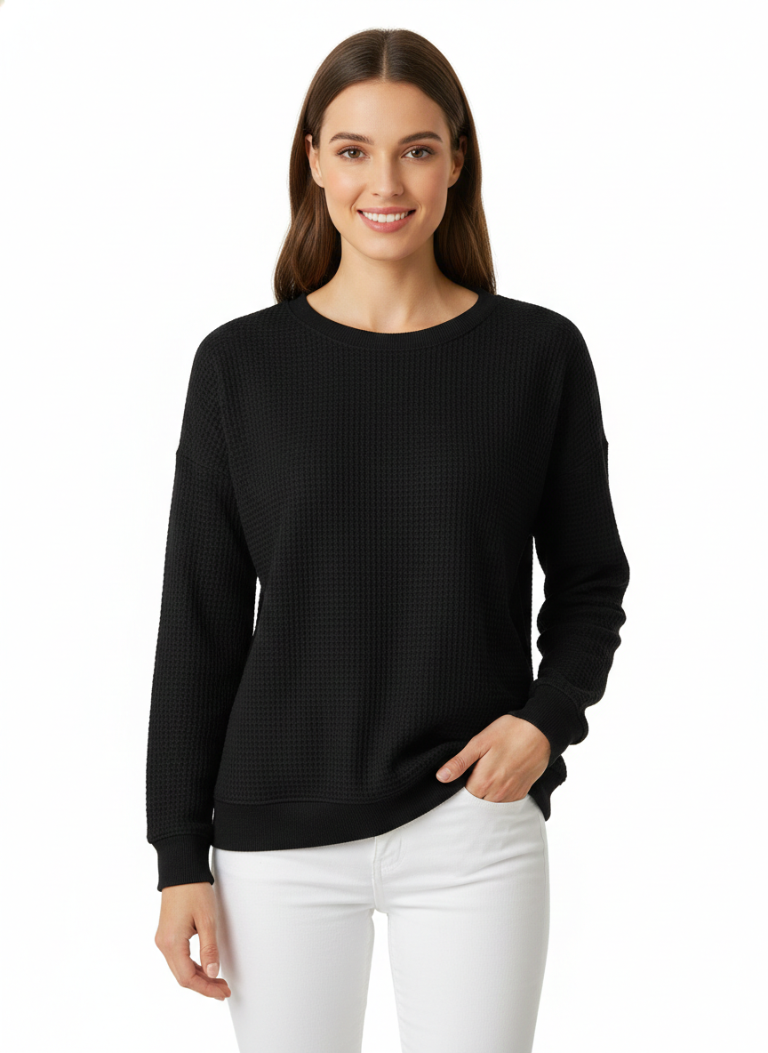 Vêtement casual femme: pull oversize confortable en maille gaufre, look moderne et relaxant.