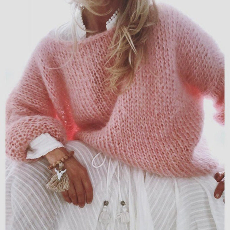 Pull femme tricoté en laine, style moderne et élégant.  Chaleur et confort assurés.