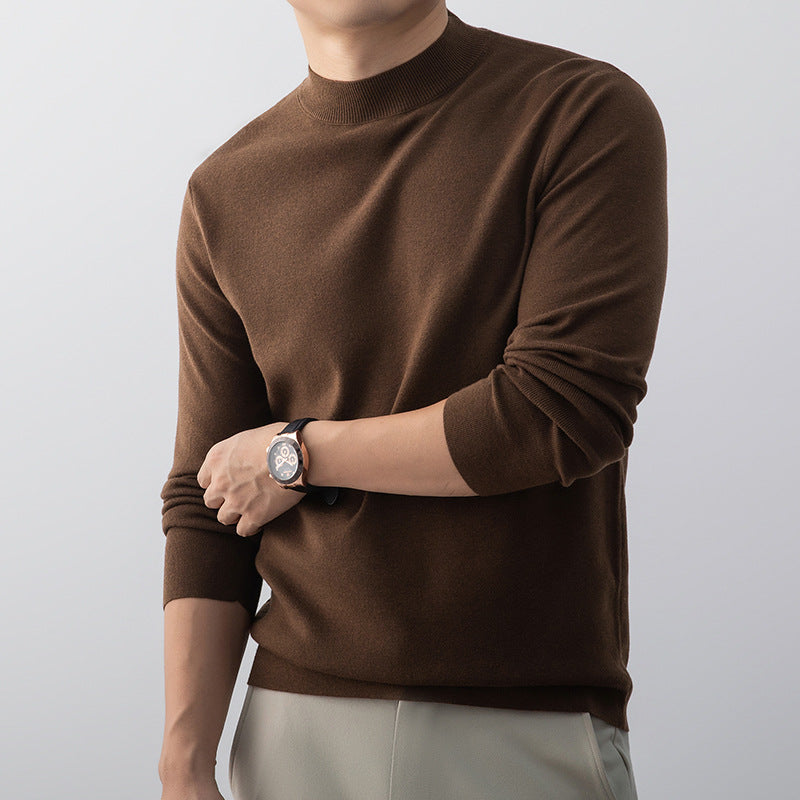 Pull homme classique élégant, col rond, confort moderne pour automne-hiver.