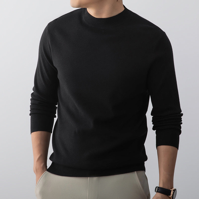 Homme portant pull polyvalent col rond, look décontracté-chic pour le quotidien.