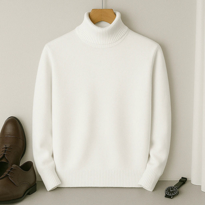 Homme portant pull col roulé, look élégant et intemporel pour la saison froide.